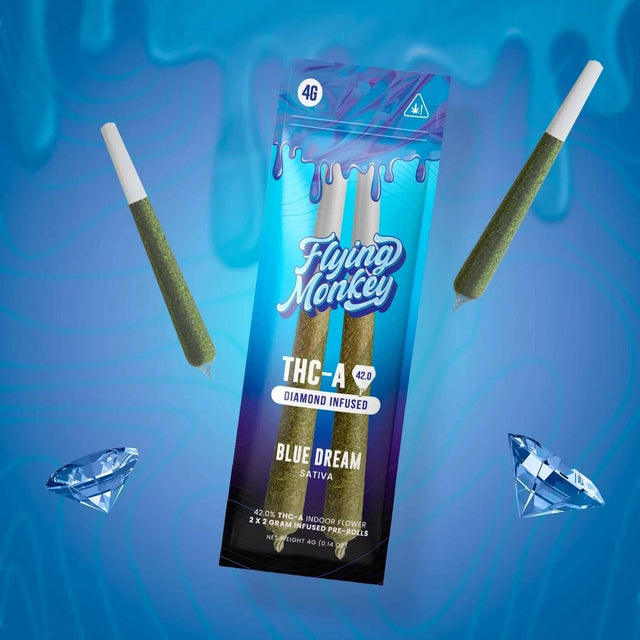 Flying Monkey Diamond Infused Pre-Rolls in a blue and purple THC-A package with two green pre-rolls and diamond graphics