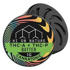 Hi on Nature Concentrate(s) Batter in a round black container with a colorful striped label marked THCA + THCP Batter, 1G, and Cannatonic.
