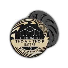 Hi on Nature Concentrate(s) Batter in a black round container with a cream and gold label marked THCA + THCP Batter 1G