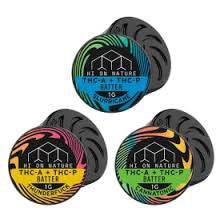 Hi On Nature Concentrate(s) jars with black lids and colorful circular labels for THCa and THC-P diamonds in sauce.