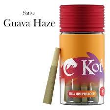 Koi THCa Kief-Infused mini pre-rolls in a small amber jar with a red ribbed lid and a tan pre-roll beside it