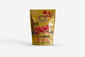 Red Eyes of LA gummy pouch in metallic gold packaging with colorful fruit graphics and THC-H gummies labeling.
