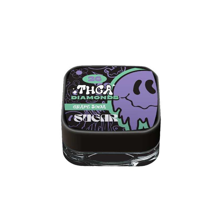 Sugar Diamonds Dab Concentrates in a black jar with a purple and green grape soda label and cartoon graphic
